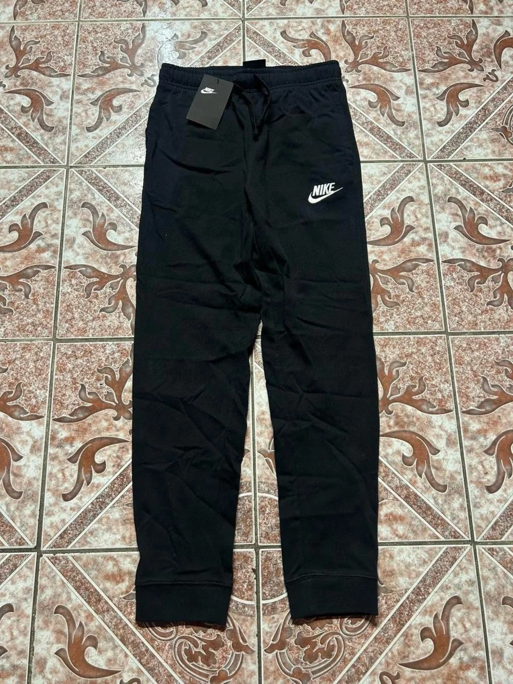 Nike Kids Black Jogger Sweatpants with White Swoosh